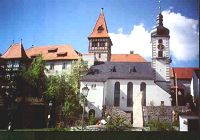Die Pfarrkirche St. Margaretha und das Schlo in Brand